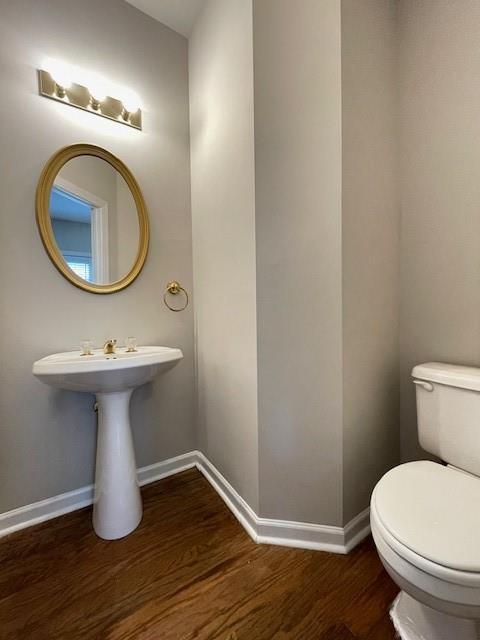 690 Kimball Parc Way, Alpharetta, GA 30022 - bathroom with wood finished floors, toilet, and baseboards