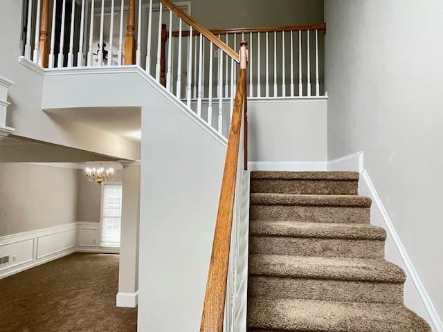 690 Kimball Parc Way, Alpharetta, GA 30022 - stairs featuring a chandelier, carpet, and a wainscoted wall