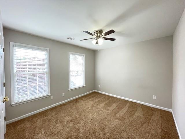 690 Kimball Parc Way, Alpharetta, GA 30022 - carpeted spare room with a ceiling fan and baseboards