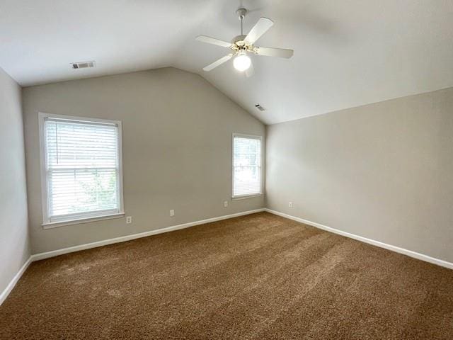 690 Kimball Parc Way, Alpharetta, GA 30022 - empty room with lofted ceiling, healthy amount of natural light, baseboards, and carpet flooring
