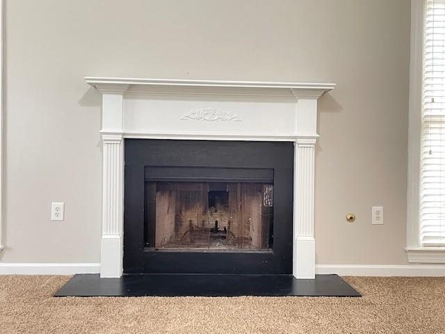 690 Kimball Parc Way, Alpharetta, GA 30022 - detailed view of a fireplace with flush hearth, carpet, and baseboards