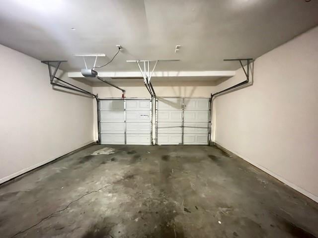 690 Kimball Parc Way, Alpharetta, GA 30022 - garage with a garage door opener