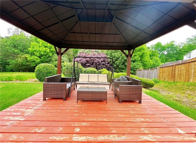 wooden terrace featuring a gazebo and an outdoor hangout area