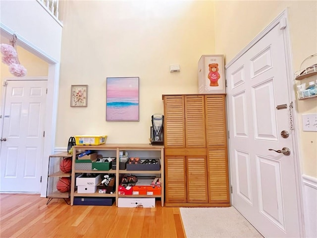 recreation room with wood finished floors