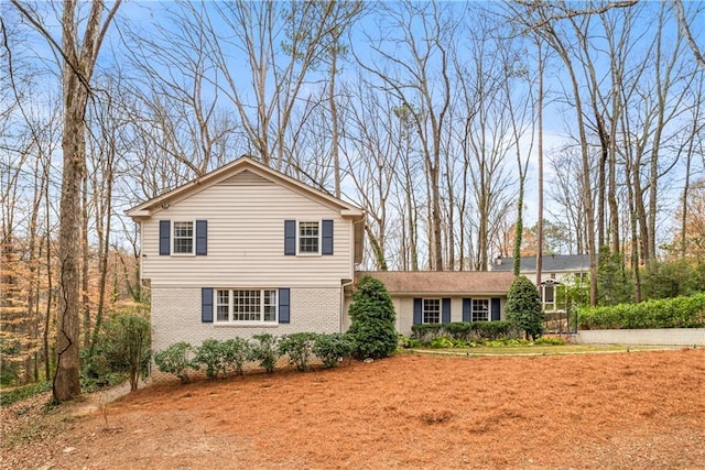 view of front of house with brick siding