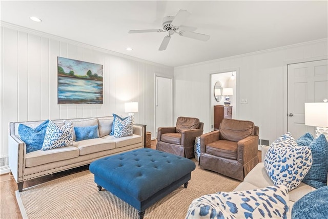 living room featuring recessed lighting, ornamental molding, visible vents, ceiling fan, and wood finished floors