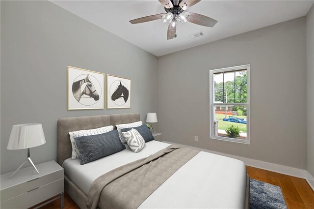 1857 Derrill Dr, Decatur, GA 30032 - bedroom with baseboards, visible vents, wood finished floors, and a ceiling fan