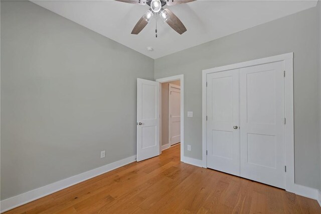 1857 Derrill Dr, Decatur, GA 30032 - unfurnished bedroom with baseboards, ceiling fan, a closet, and light wood finished floors