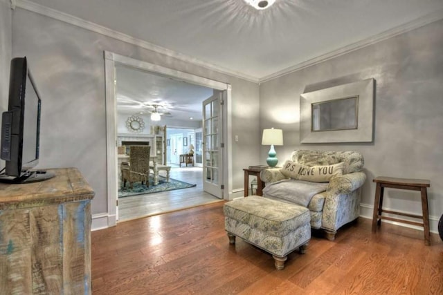 76 White Oak Dr, Blue Ridge, GA 30513 - sitting room with wood finished floors, crown molding, baseboards, and french doors