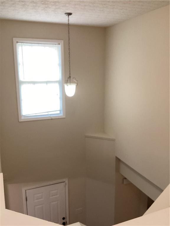 bathroom featuring a textured ceiling