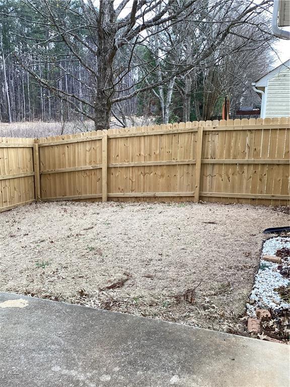 view of yard featuring fence