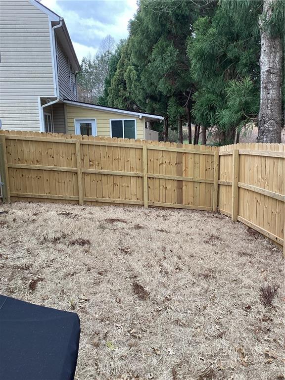 view of yard featuring fence