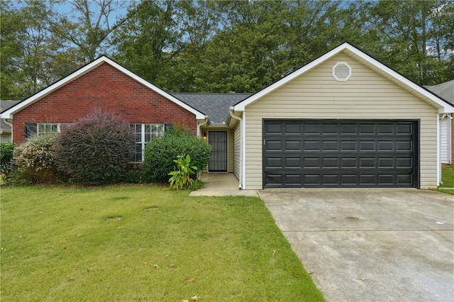 single story home featuring a front yard and a garage