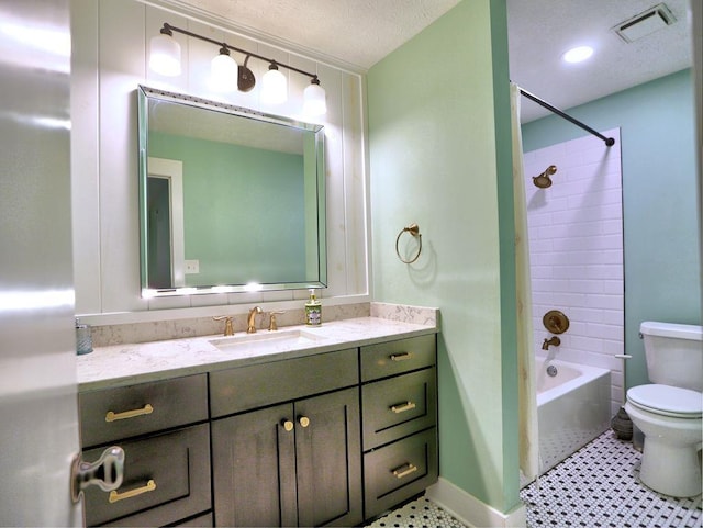 2210 Cumberland Ct SE, Smyrna, GA 30080 - bathroom with toilet, vanity, tub / shower combination, and a textured ceiling