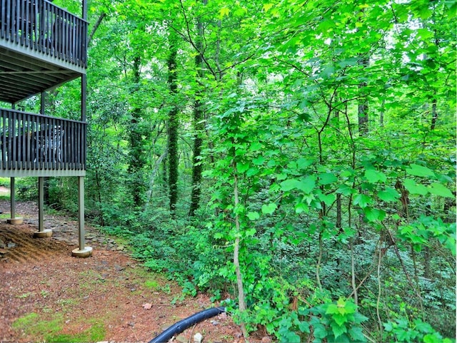 2210 Cumberland Ct SE, Smyrna, GA 30080 - view of yard featuring a wooden deck