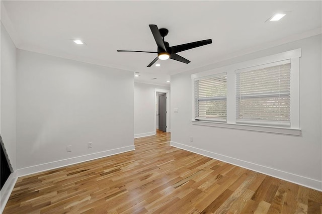 unfurnished room featuring light hardwood / wood-style floors and ceiling fan