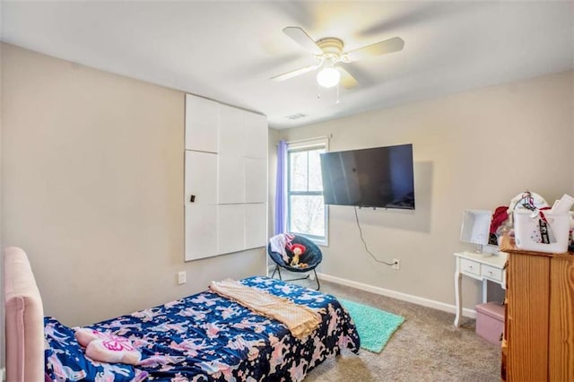 bedroom featuring a ceiling fan, carpet, visible vents, and baseboards