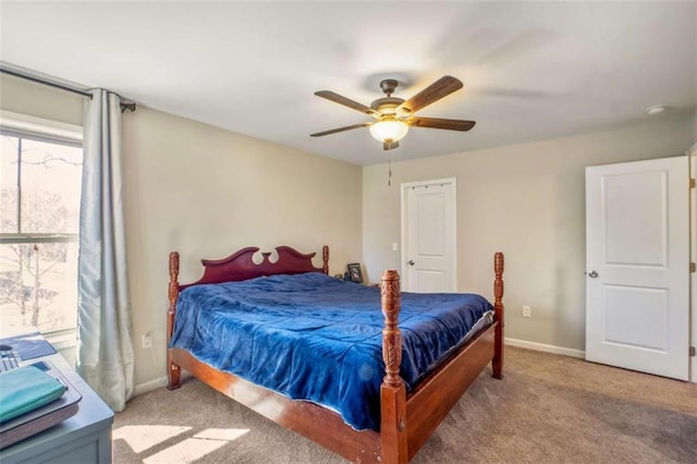 bedroom with carpet flooring, ceiling fan, and baseboards