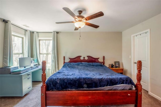 bedroom featuring carpet, visible vents, and ceiling fan