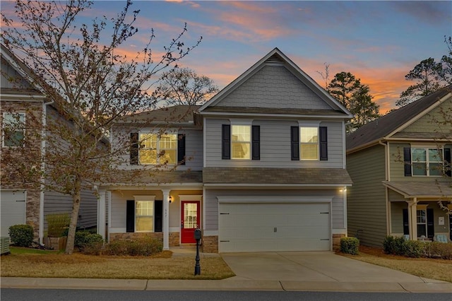 craftsman-style home with a garage