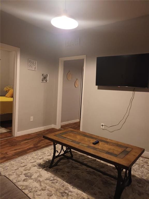 living room with dark wood-type flooring