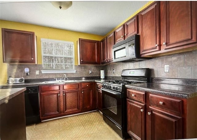 kitchen featuring tasteful backsplash, sink, and black appliances