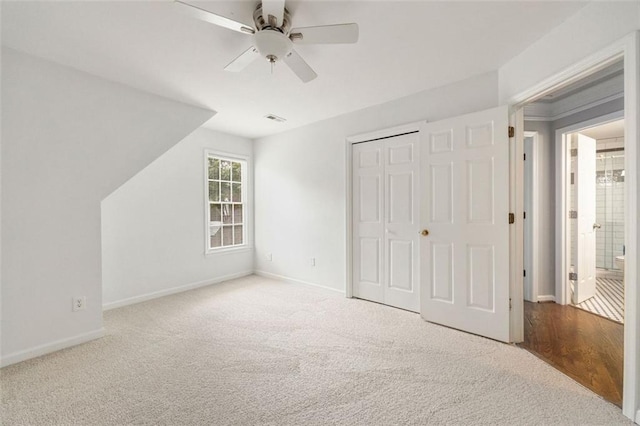 10000 Groomsbridge Rd, Johns Creek, GA 30022 - unfurnished bedroom featuring carpet, baseboards, a closet, and ceiling fan