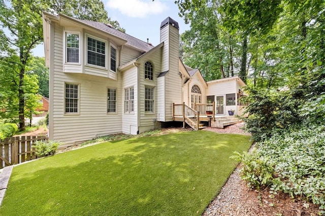10000 Groomsbridge Rd, Johns Creek, GA 30022 - rear view of house featuring a chimney and a deck