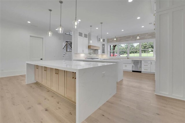 3903 Indian Shoals Rd SE, Bethlehem, GA 30620 - kitchen with dishwasher, a large island, light wood-style floors, and recessed lighting