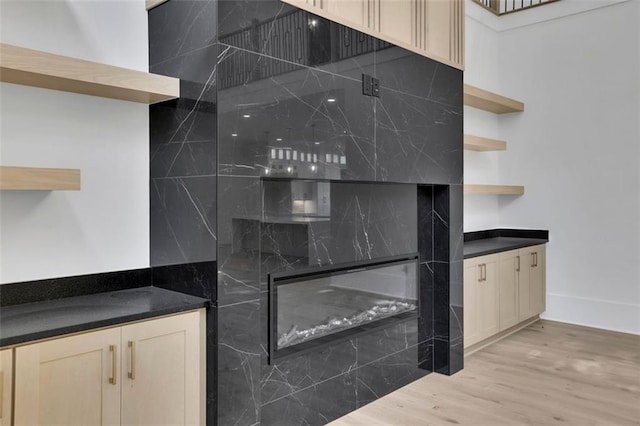 3903 Indian Shoals Rd SE, Bethlehem, GA 30620 - kitchen with open shelves, light wood-style floors, and dark countertops