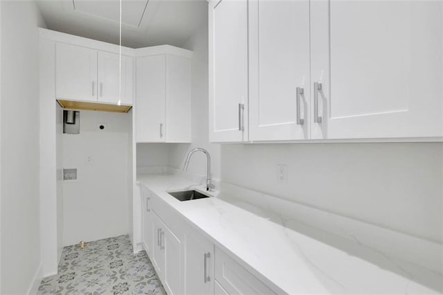3903 Indian Shoals Rd SE, Bethlehem, GA 30620 - laundry area featuring cabinet space, electric dryer hookup, and attic access