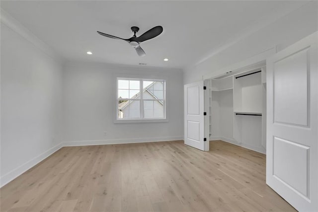 3903 Indian Shoals Rd SE, Bethlehem, GA 30620 - unfurnished bedroom featuring light wood finished floors, ornamental molding, ceiling fan, recessed lighting, and a closet