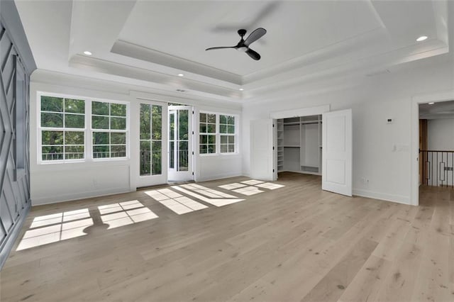 3903 Indian Shoals Rd SE, Bethlehem, GA 30620 - unfurnished bedroom with a tray ceiling, recessed lighting, light wood finished floors, ornamental molding, and ceiling fan