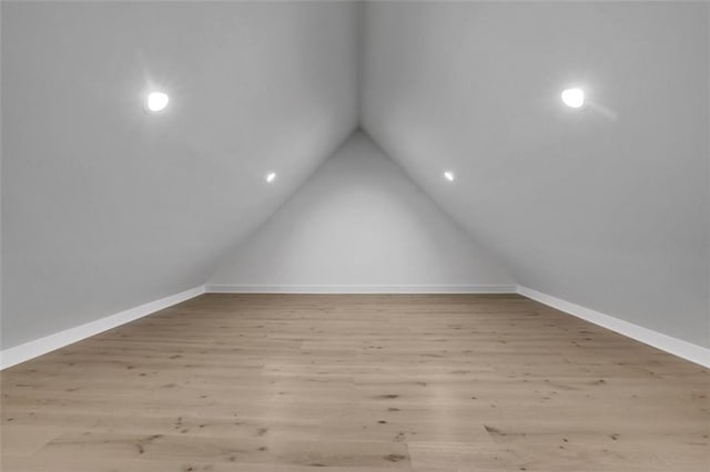 3903 Indian Shoals Rd SE, Bethlehem, GA 30620 - additional living space with wood finished floors, vaulted ceiling, and recessed lighting