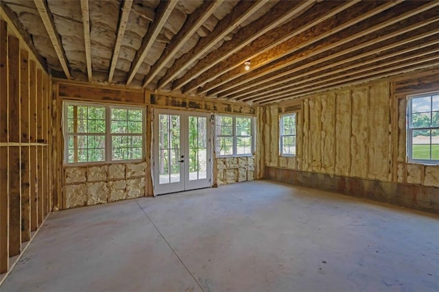 3903 Indian Shoals Rd SE, Bethlehem, GA 30620 - miscellaneous room featuring french doors and unfinished concrete floors