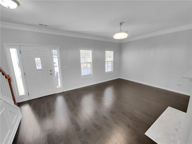 foyer entrance with baseboards, crown molding, visible vents, and dark wood-style flooring