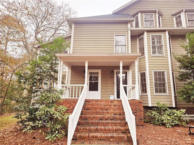 view of front of home featuring covered porch