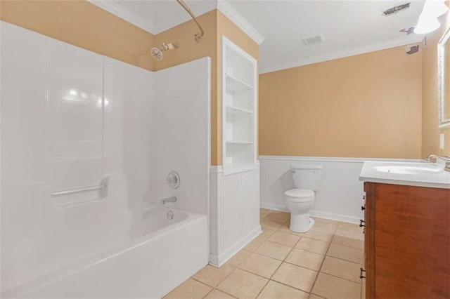 full bathroom featuring tile patterned floors, toilet, bathing tub / shower combination, crown molding, and vanity