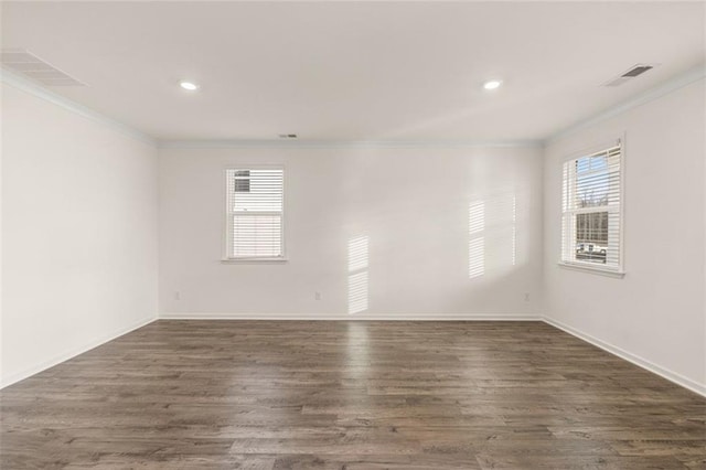 1159 Blue Juniper Cir, Loganville, GA 30052 - unfurnished room with crown molding, dark wood-style flooring, recessed lighting, and baseboards
