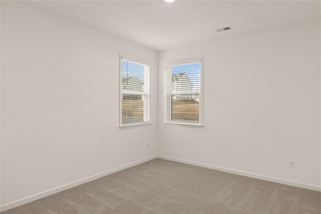 1159 Blue Juniper Cir, Loganville, GA 30052 - empty room featuring carpet and baseboards