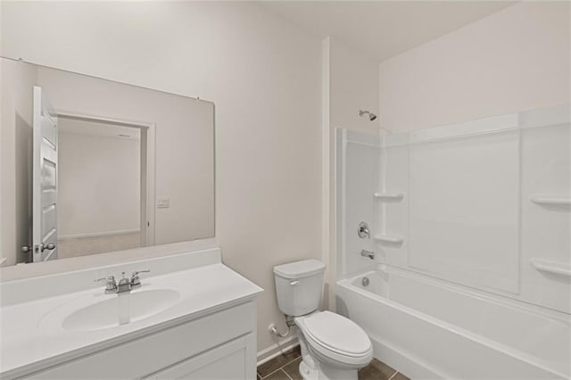 1159 Blue Juniper Cir, Loganville, GA 30052 - full bath featuring vanity, toilet,  shower combination, baseboards, and tile patterned floors