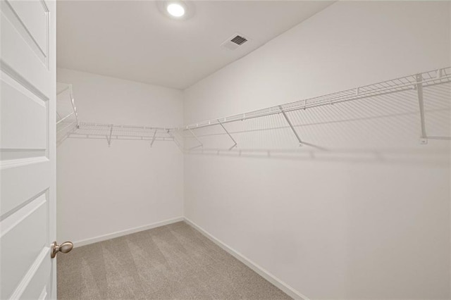 1159 Blue Juniper Cir, Loganville, GA 30052 - spacious closet featuring light carpet
