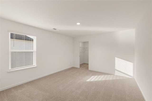 1159 Blue Juniper Cir, Loganville, GA 30052 - unfurnished room featuring light carpet, baseboards, and recessed lighting