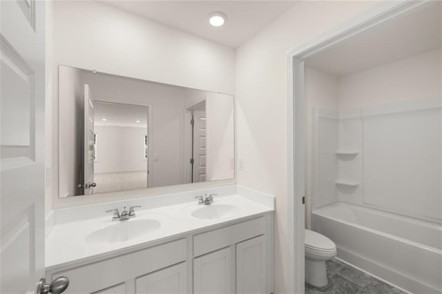 1159 Blue Juniper Cir, Loganville, GA 30052 - bathroom with double vanity, toilet, and shower / washtub combination