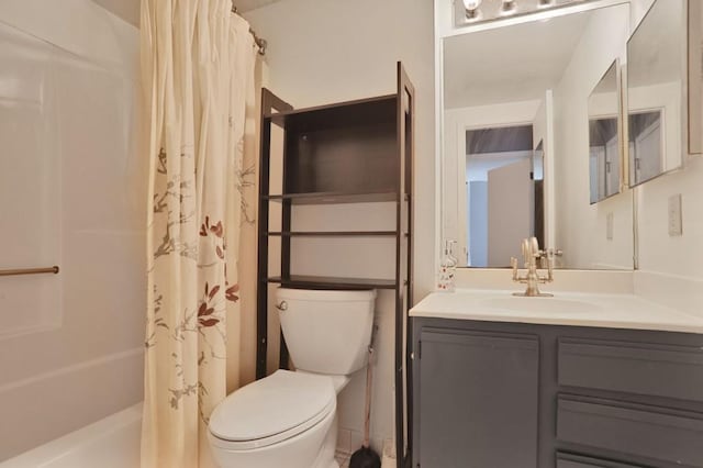 bathroom with vanity, toilet, and a shower with curtain