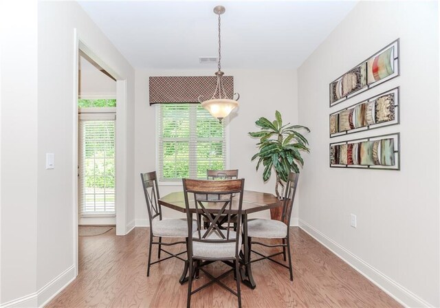 1555 Water Vista Ct Unit 4102, Cumming, GA 30041 - dining area with light wood finished floors and baseboards