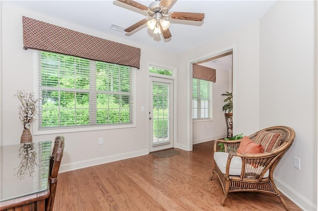 1555 Water Vista Ct Unit 4102, Cumming, GA 30041 - sitting room featuring light wood-style floors, baseboards, and ceiling fan