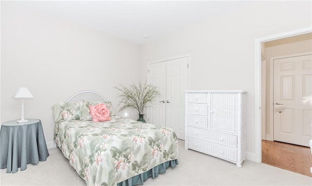1555 Water Vista Ct Unit 4102, Cumming, GA 30041 - bedroom featuring a closet, carpet, and baseboards
