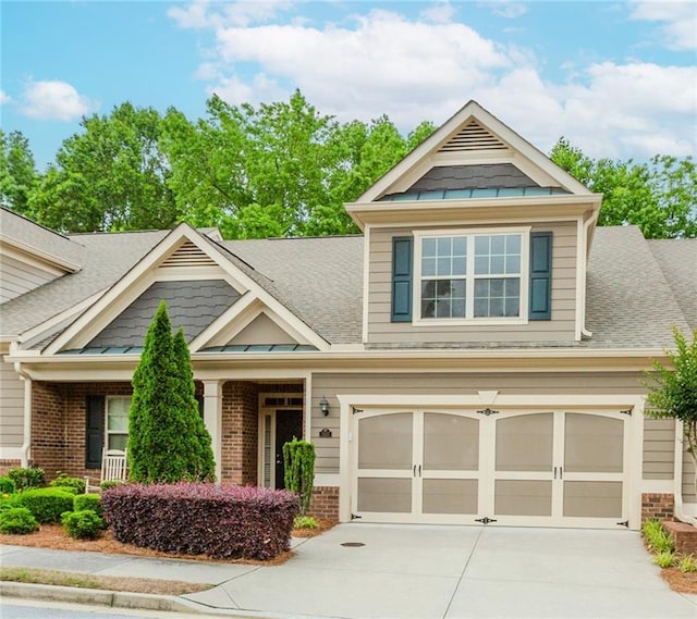 1555 Water Vista Ct Unit 4102, Cumming, GA 30041 - craftsman inspired home with brick siding, concrete driveway, a shingled roof, and an attached garage