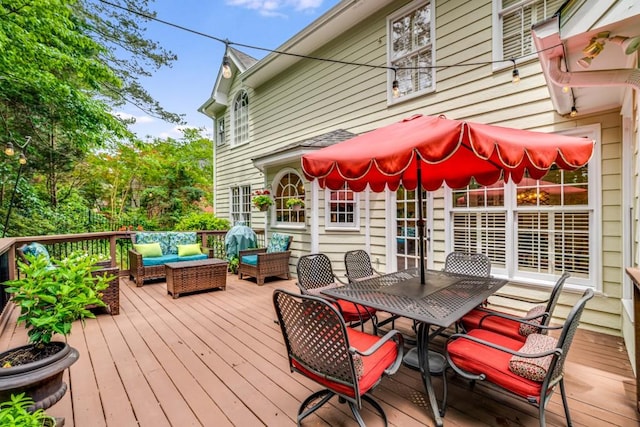 wooden deck featuring an outdoor hangout area and outdoor dining area